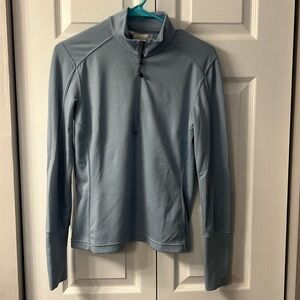 Powder blue women’s Nike golf half zip pullover